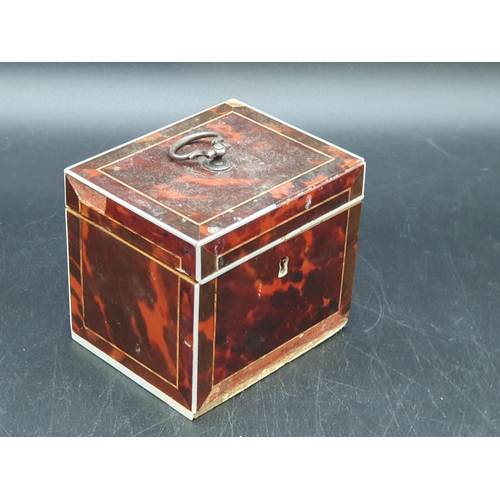 53 - A 19th Century red tortoiseshell Tea Caddy with inlaid stringing, loop handle,  4 x 3in, A/F, (R1)