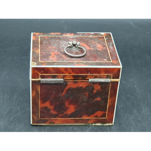 53 - A 19th Century red tortoiseshell Tea Caddy with inlaid stringing, loop handle,  4 x 3in, A/F, (R1)