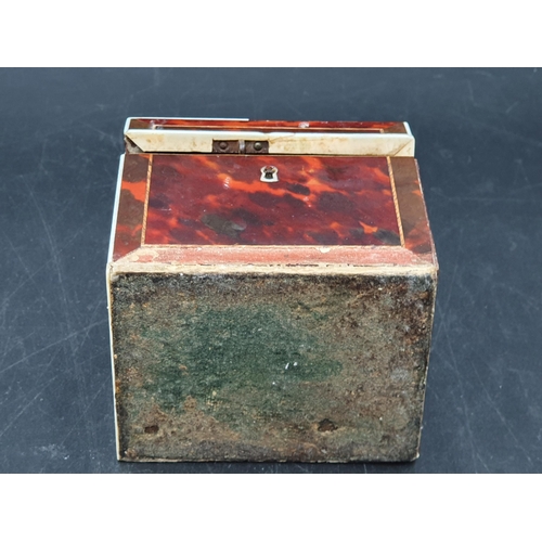 53 - A 19th Century red tortoiseshell Tea Caddy with inlaid stringing, loop handle,  4 x 3in, A/F, (R1)