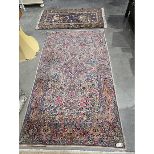 54 - A fine cotton Persian Rug with all-over floral designs in predominantly reds, and blues, 7ft x 3ft 1... 