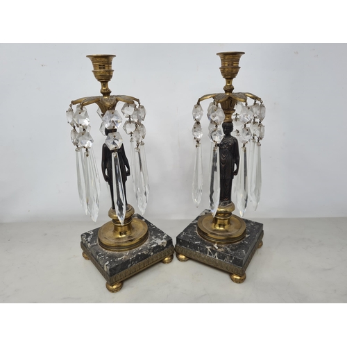 55 - A pair of 19th Century gilt brass and bronzed Table Lustres with Egyptian style classical maidens su... 