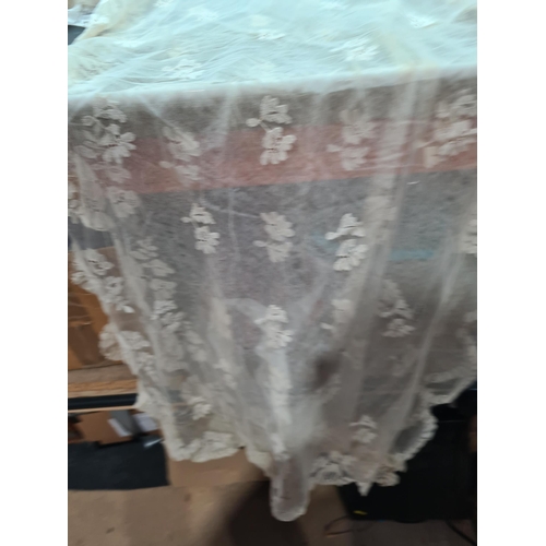 56 - A quantity of Lace including long table runner with floral design, 10ft x 2ft, table mat and place m... 