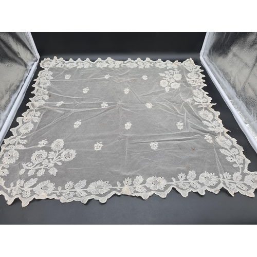 56 - A quantity of Lace including long table runner with floral design, 10ft x 2ft, table mat and place m... 