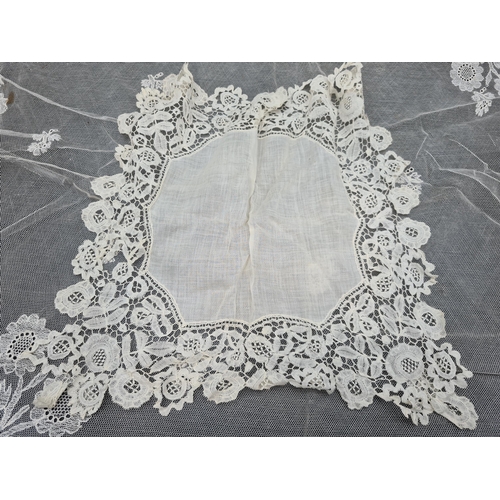 56 - A quantity of Lace including long table runner with floral design, 10ft x 2ft, table mat and place m... 