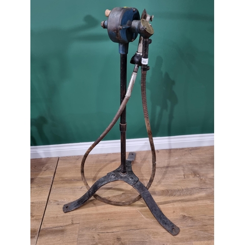 564 - A Wolseley 16 Sheep Shearing Machine with turned wooden handles and raised on tripod support, 3ft 3