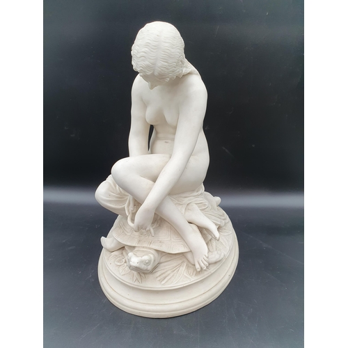 59 - A 19th century parian Figure of Goddess Latona resting on a turtle on oval base, 14 1/2in