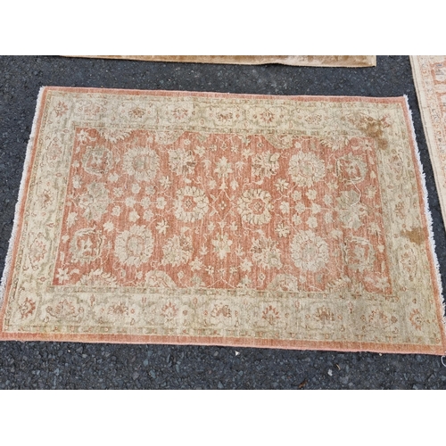 590 - Four small floral patterned Rugs