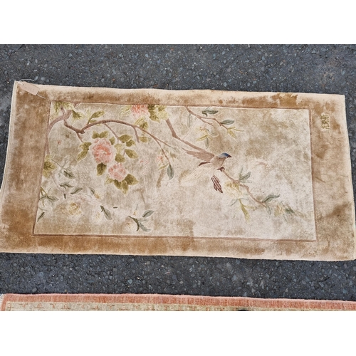 590 - Four small floral patterned Rugs