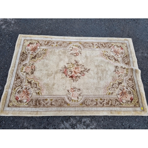 590 - Four small floral patterned Rugs