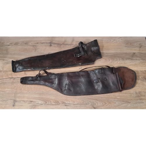 594 - Two Vintage leather Shotgun Slips, A/F. (R9).