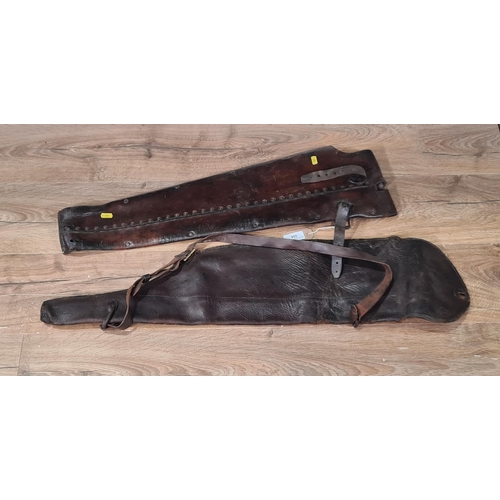 594 - Two Vintage leather Shotgun Slips, A/F. (R9).