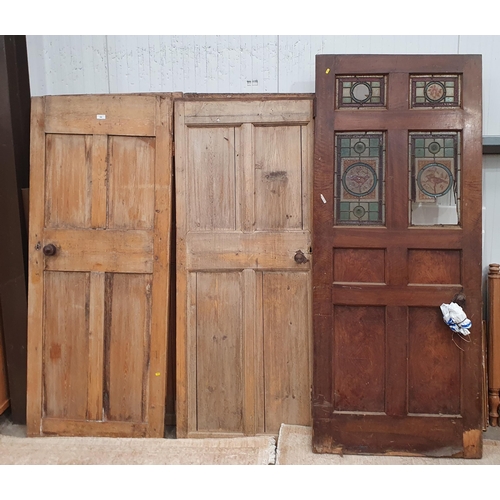 595 - Four internal pine panelled Doors and a mahogany veneered Door with stained glass panelled top secti... 