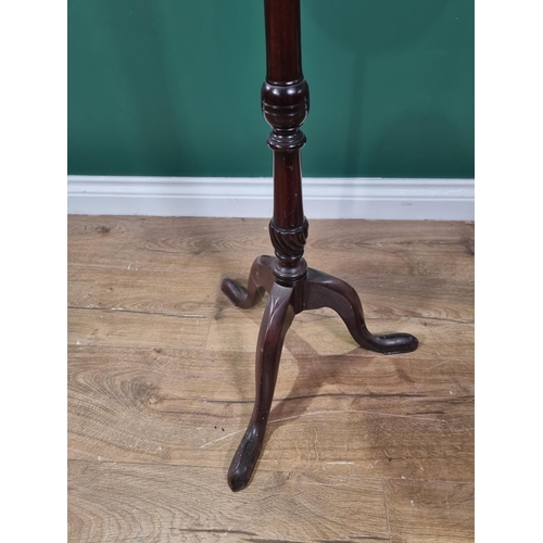 641 - A mahogany Plantstand with slender column and tripod base, 3ft 4in H (R2)