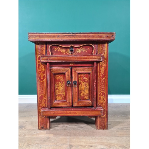 654 - An Oriental red painted Cupboard with single drawer above pair of panelled doors, decorated with sce... 