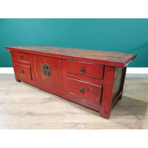 655 - An Oriental red painted low Sideboard, with pair of cupboard doors, flanked by two pairs of drawers ... 