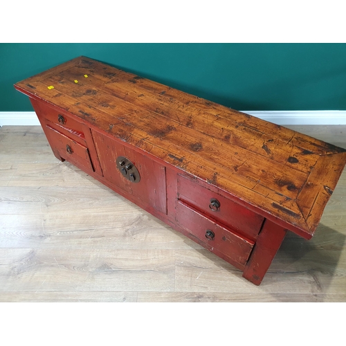 655 - An Oriental red painted low Sideboard, with pair of cupboard doors, flanked by two pairs of drawers ... 