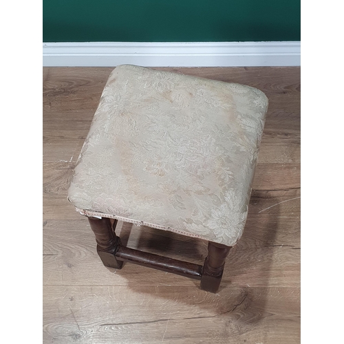 9 - An 18th century Joint Stool in mixed woods having later upholstered top on turned legs united by squ... 