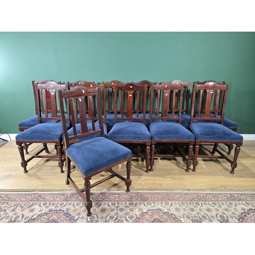 659 - A set of twelve mahogany framed Dining Chairs with splat backs, blue upholstered seats and turned fr... 