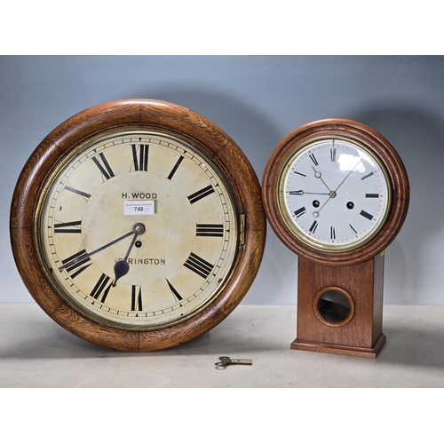 748 - An oak cased Wall clock with circular dial marked with Roman numerals and named 