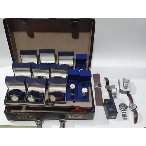 268 - A briefcase containing a collection of modern mostly quartz gentleman's Wristwatches