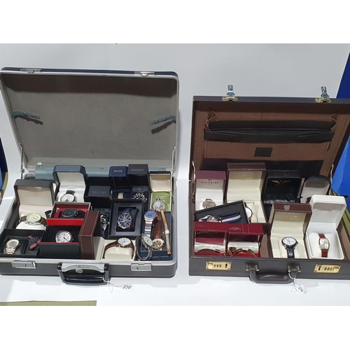 270 - Two briefcases containing a collection of modern mostly quartz gentleman's Wristwatches