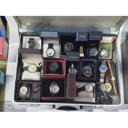 270 - Two briefcases containing a collection of modern mostly quartz gentleman's Wristwatches