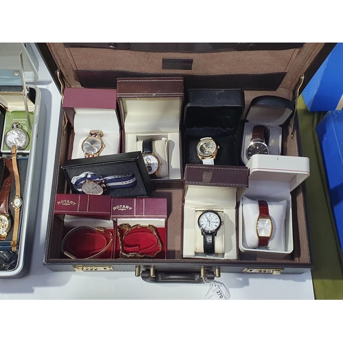 270 - Two briefcases containing a collection of modern mostly quartz gentleman's Wristwatches