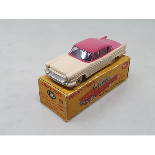 1439 - A boxed Dinky Toys No.180 cream and pink Packard Clipper Sedan, VG, box VG