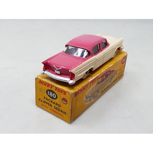 1439 - A boxed Dinky Toys No.180 cream and pink Packard Clipper Sedan, VG, box VG