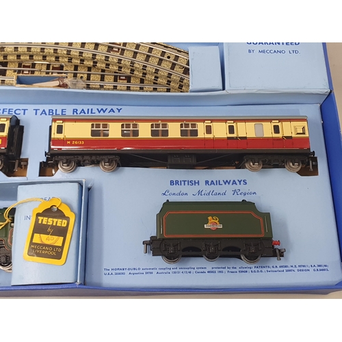 1037 - A boxed Hornby Dublo EDP12 matt 'Duchess of Montrose' Passenger Set, superb example as it left the f... 