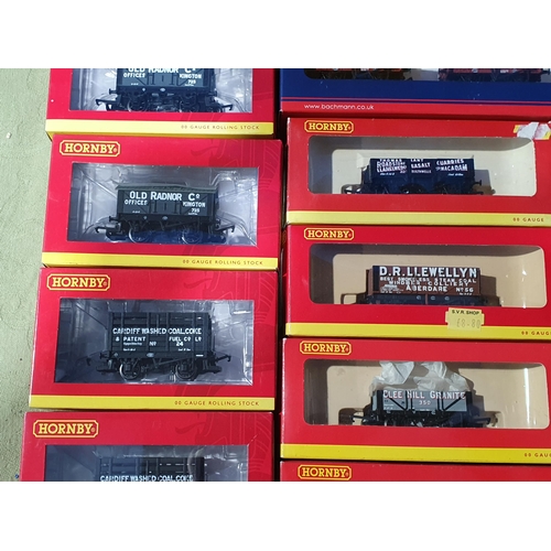 1243 - Twenty boxed Hornby, Bachmann and other 00 gauge private owner Wagons and a boxed Bachmann pack of t... 