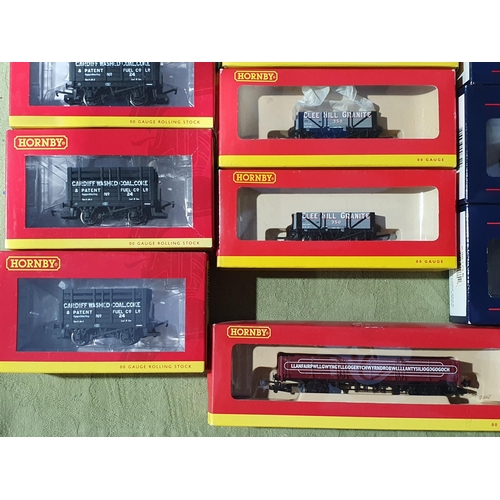 1243 - Twenty boxed Hornby, Bachmann and other 00 gauge private owner Wagons and a boxed Bachmann pack of t... 