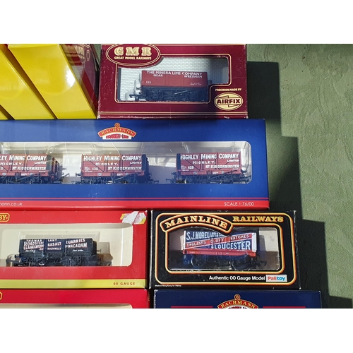 1243 - Twenty boxed Hornby, Bachmann and other 00 gauge private owner Wagons and a boxed Bachmann pack of t... 