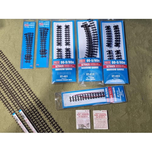 1260 - A quantity of unused Peco 009 gauge Track including SL-E491 and SL-E492 L/H and R/H streamline Point... 