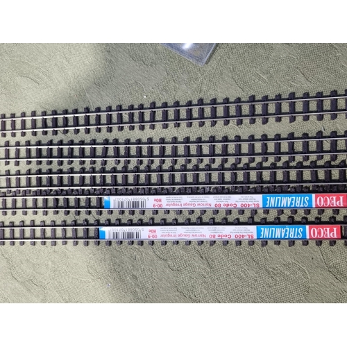 1260 - A quantity of unused Peco 009 gauge Track including SL-E491 and SL-E492 L/H and R/H streamline Point... 