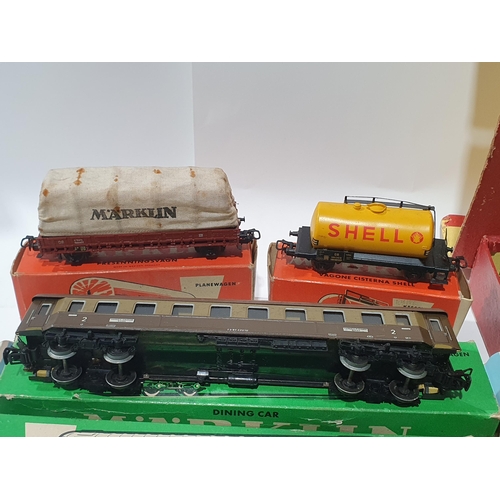 1263 - A boxed Marklin HO scale 0-6-0T Goods Set, a boxed Bo-Bo diesel Locomotive, two boxed Coaches, five ... 