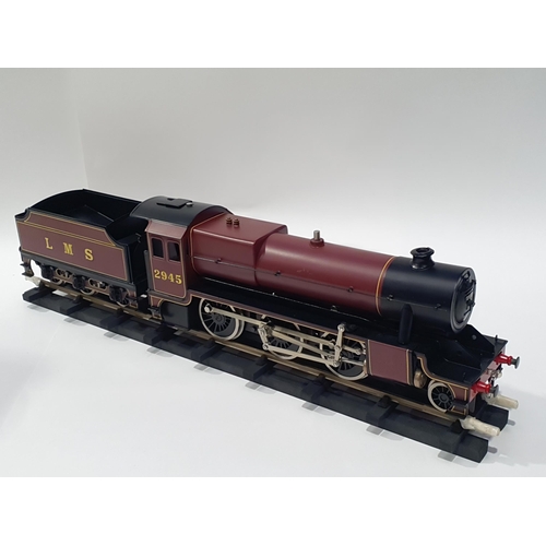 1267 - A boxed Bassett-Lowke Special Limited Release 0 gauge live steam Stanier 2-6-0 Mogul in L.M.S. maroo... 