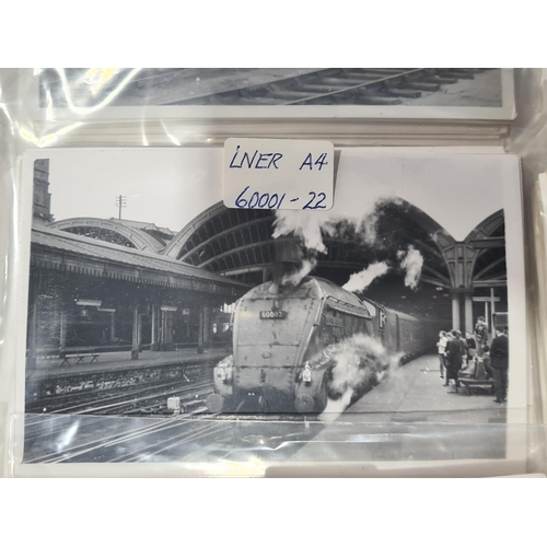 1277 - A box of Railway Photographs including S.R. 'N', 'U', Merchant Navy, West Country Classes. B.R. Stan... 