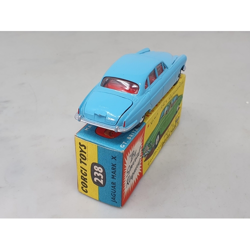 1291 - A boxed Corgi Toys No.238 pale blue Jaguar Mk.10 with luggage in the boot, Nr M-M, box Ex