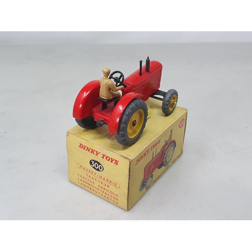 1309 - A boxed Dinky Toys No.300 Massey-Harris Tractor, Nr M, box G