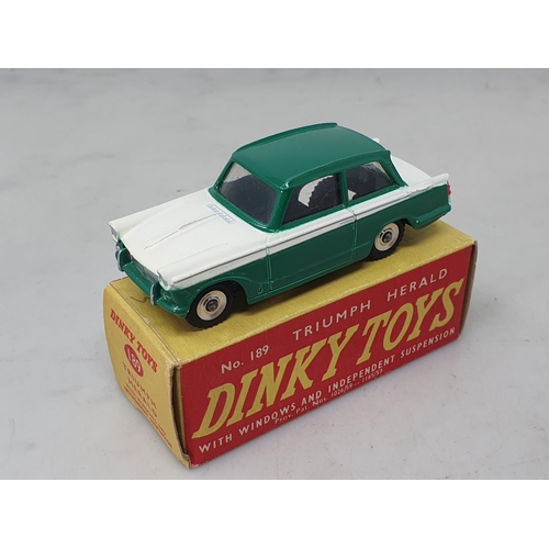 1320 - A boxed Dinky Toys No.189 green and white Triumph Herald, Nr M-M, box Nr perfect