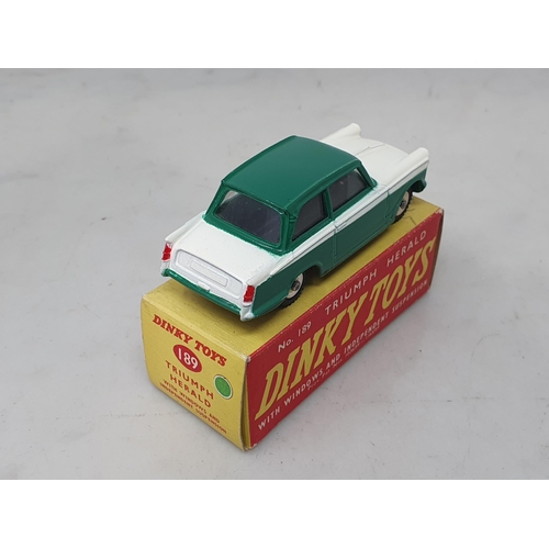 1320 - A boxed Dinky Toys No.189 green and white Triumph Herald, Nr M-M, box Nr perfect