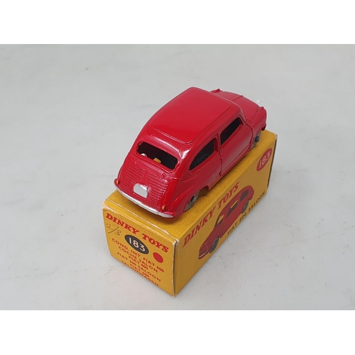 1324 - A boxed Dinky Toys No.183 red Fiat 600 Saloon with treaded tyres, Nr M-M, box Ex plus