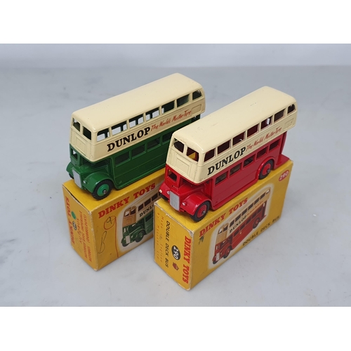 1326 - Two boxed Dinky Toys No.290 Double Deck Bus, one red and cream, the other green and cream, both Nr M... 