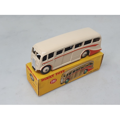 1328 - A boxed Dinky Toys No.281 cream Luxury Coach with orange flash, Nr M-M, box Ex plus