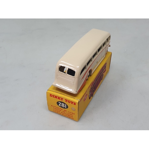 1328 - A boxed Dinky Toys No.281 cream Luxury Coach with orange flash, Nr M-M, box Ex plus