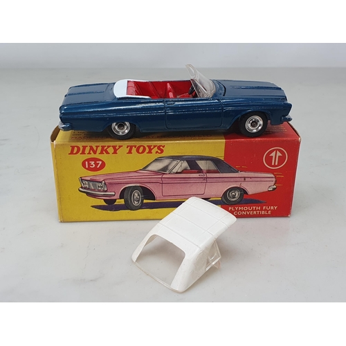 1341 - A boxed Dinky Toys No.137 dark blue Plymouth Fury, Nr M-M, box Ex plus