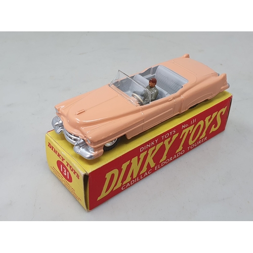 1343 - A boxed Dinky Toys No.131 pink Cadillac Eldorado Tourer with spun hubs, M, box Ex plus with packing