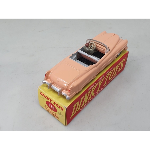 1343 - A boxed Dinky Toys No.131 pink Cadillac Eldorado Tourer with spun hubs, M, box Ex plus with packing