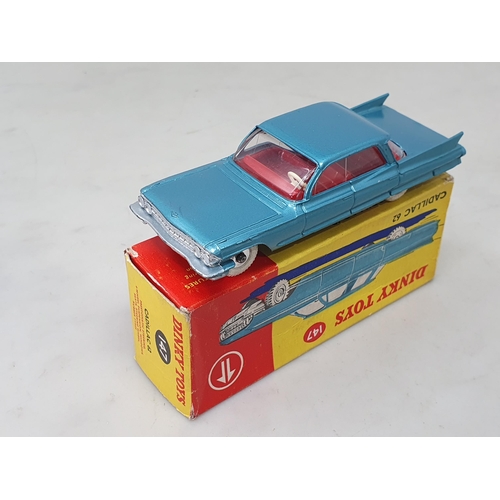 1345 - A boxed Dinky Toys No.147 metallic blue Cadillac 62 with red interior, M, box Ex